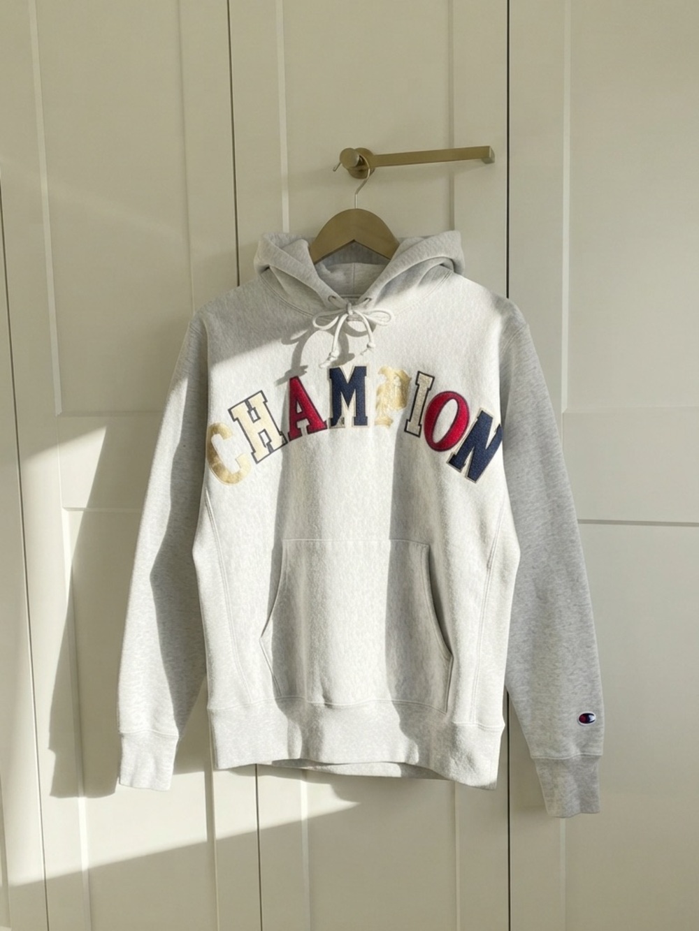 Champion Light Gray Hoodie with Multicolor Arch Logo